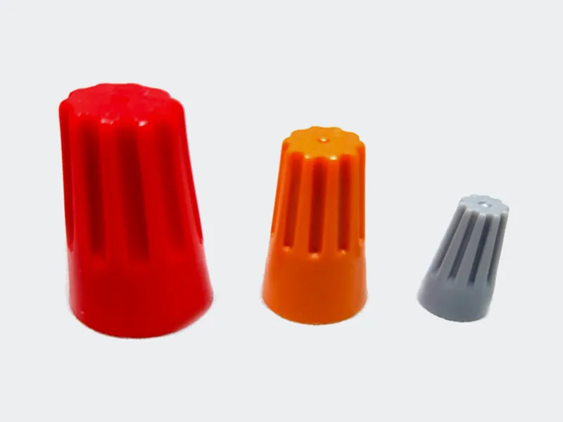 Conectores ciegos de rosca rojo, naranja y gris